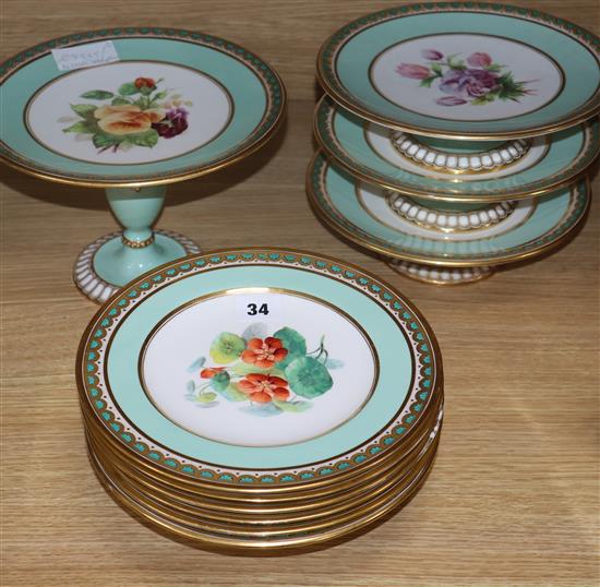 A 19th century dessert set with gilt border and floral centres